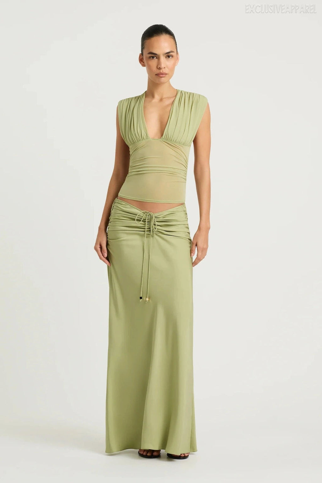 Zoya Green Sleeveless Deep V Pleated Skirt Set