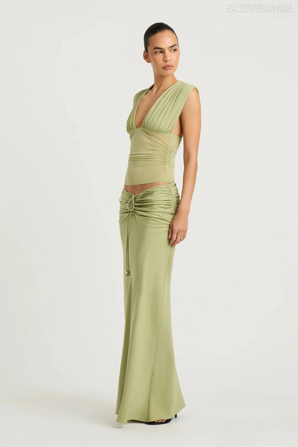 Zoya Green Sleeveless Deep V Pleated Skirt Set